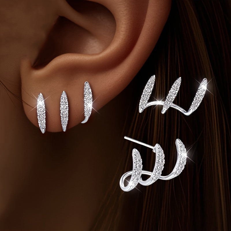 Elegantne naušnice sa tri kandže ukrašene draguljima